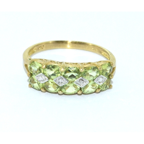 168 - 9ct gold ladies vintage twin row Peridot with accent Diamond hall marked in the ring held in a box s... 