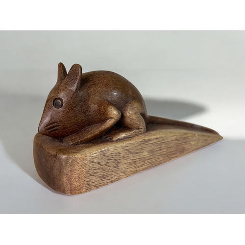 149 - A carved hardwood mouse door wedge. Impressed mark J.W.F. Logdell. Together with a carving of a Koal... 