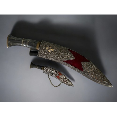 28 - A Burmese ceremonial (Kothimora) Khukuri knife, with matching smaller.20th century.Velvet & silv... 