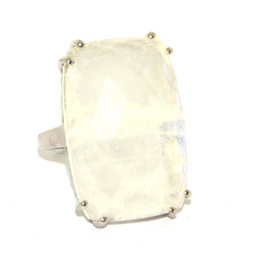 208 - 925 silver ladies large set rough clear crystal oblong single stone ring in an open scroll setting s... 
