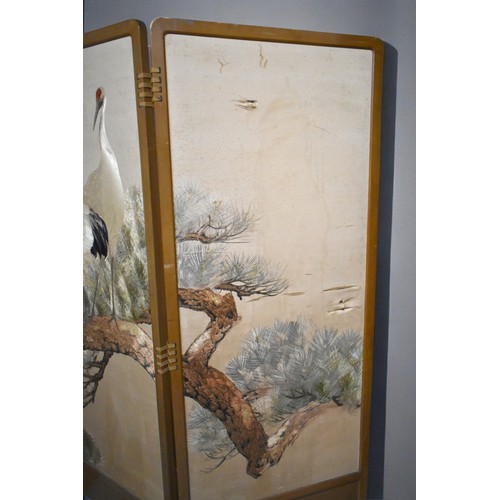 57 - A Japanese embroidered folding screen.Early-mid 20th century.carved wooden frame, with embroidered w... 