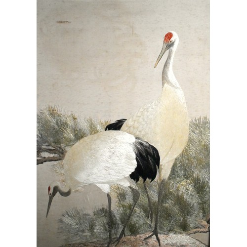 57 - A Japanese embroidered folding screen.Early-mid 20th century.carved wooden frame, with embroidered w... 