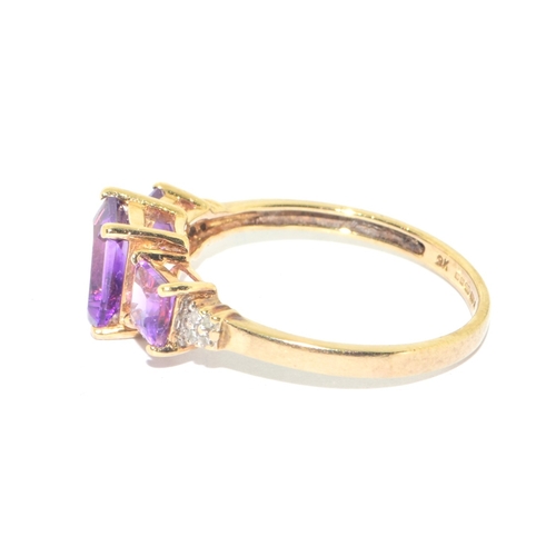 36 - 9ct gold ladies 3 graduated stone Amethyst and accent diamond ring size P