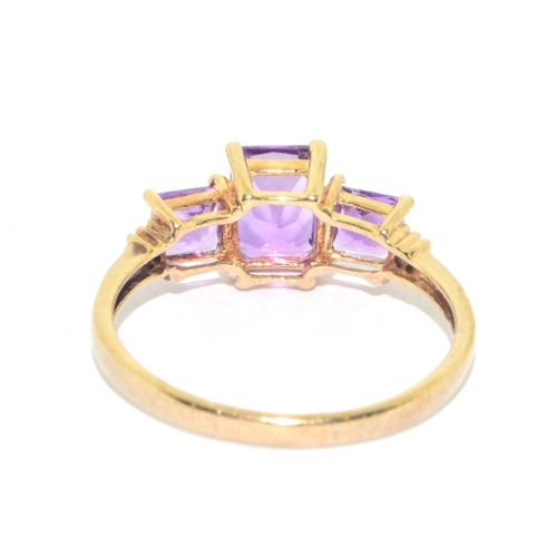 36 - 9ct gold ladies 3 graduated stone Amethyst and accent diamond ring size P