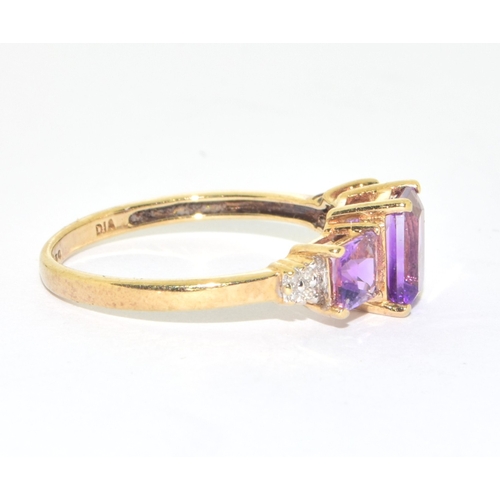 36 - 9ct gold ladies 3 graduated stone Amethyst and accent diamond ring size P