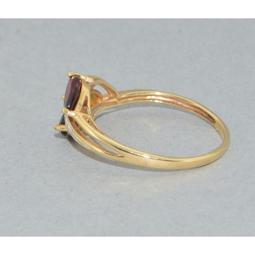 60 - 9ct gold ladies Citrine, Garnet, Quarts ring with accent Diamond to the centre sweep size Q
