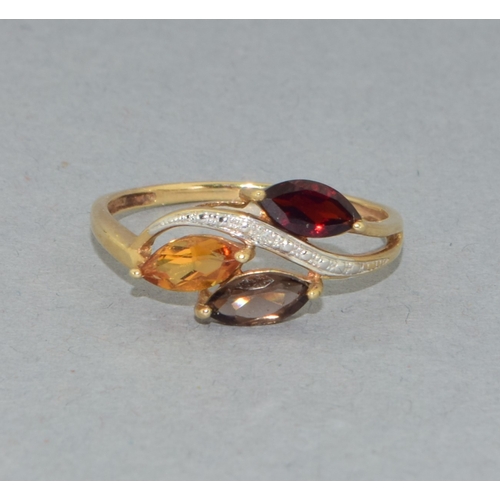 60 - 9ct gold ladies Citrine, Garnet, Quarts ring with accent Diamond to the centre sweep size Q