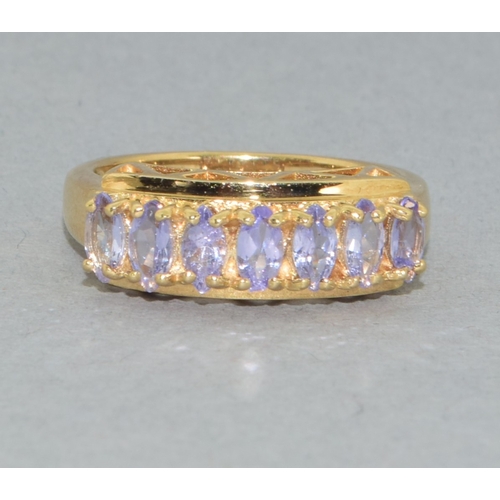 183 - 9ct gold ladies 7 stone Tanzanite large set bar ring set in an open work design 4grams size N