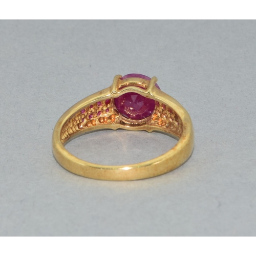 41 - 9ct gold ladies Ruby solitaire ring with accent Rubies to the shoulders size P 3.5gram