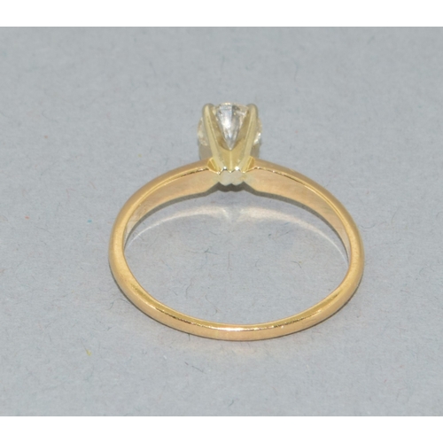 13 - 14ct gold ladies Diamond solitaire ring held in a claw setting stone approx 0.50ct size N
