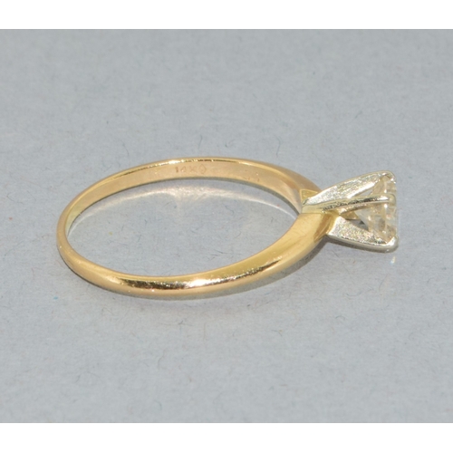 13 - 14ct gold ladies Diamond solitaire ring held in a claw setting stone approx 0.50ct size N