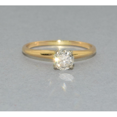 13 - 14ct gold ladies Diamond solitaire ring held in a claw setting stone approx 0.50ct size N