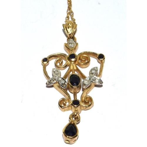 59 - 9ct gold laverier pendant set with Diamonds and Sapphire on a 46cm gold neck chain