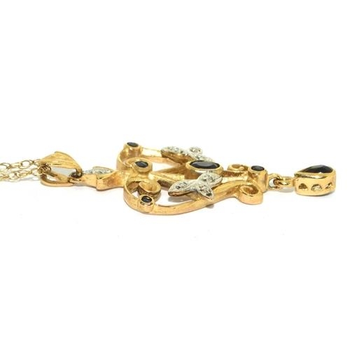 59 - 9ct gold laverier pendant set with Diamonds and Sapphire on a 46cm gold neck chain