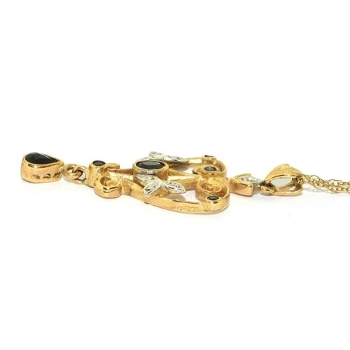 59 - 9ct gold laverier pendant set with Diamonds and Sapphire on a 46cm gold neck chain