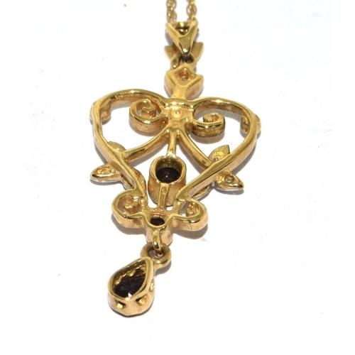 59 - 9ct gold laverier pendant set with Diamonds and Sapphire on a 46cm gold neck chain