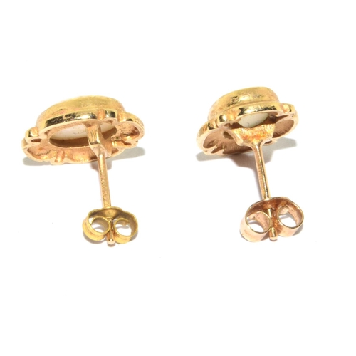 57 - 9ct gold Opal framed stud earrings 2.1grm