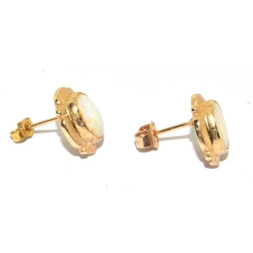 57 - 9ct gold Opal framed stud earrings 2.1grm