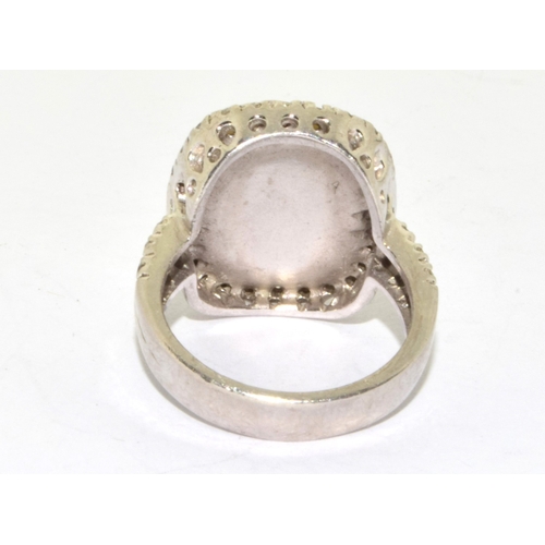28 - 925 silver ladies facetted milky Chrystal halo design ring size M