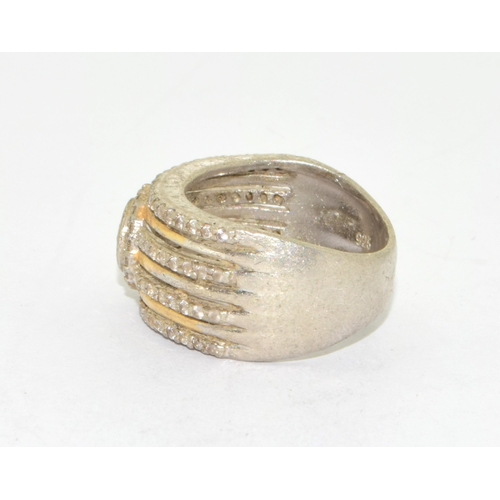48 - 925 silver 3 x row ring with a clear centre stone  size N