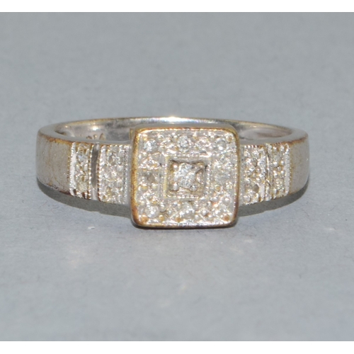 20 - 9ct white gold Diamond cluster ring hall marked as Diamond in the ring size M 3gram