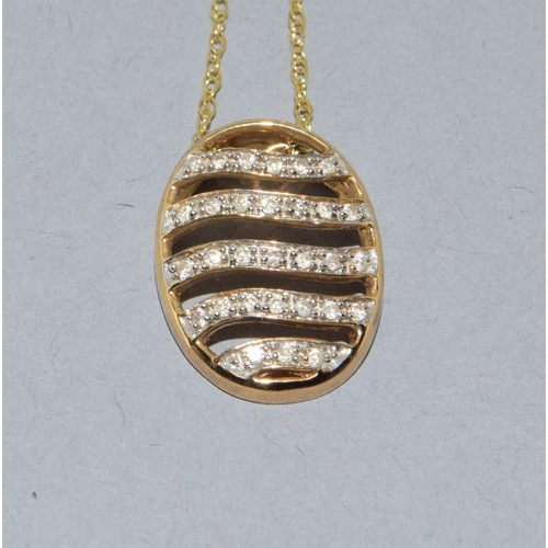 204 - 9ct gold Diamond 5 row pendant necklace on a 9ct gold neck chain of 42cm long