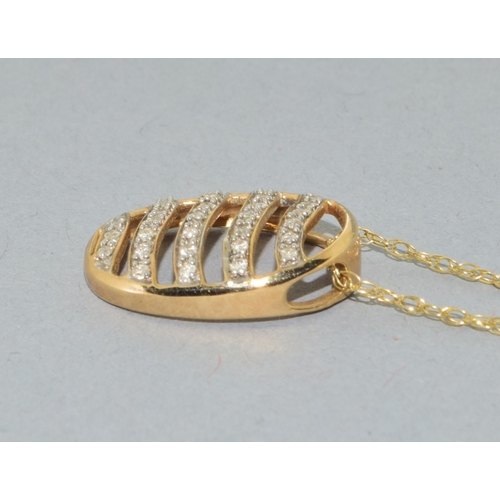 204 - 9ct gold Diamond 5 row pendant necklace on a 9ct gold neck chain of 42cm long