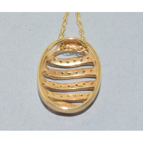 204 - 9ct gold Diamond 5 row pendant necklace on a 9ct gold neck chain of 42cm long