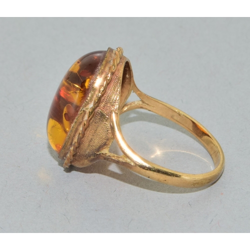 238 - 9ct gold ladies large size vintage  Amber dress ring held in an enclosed design size Q