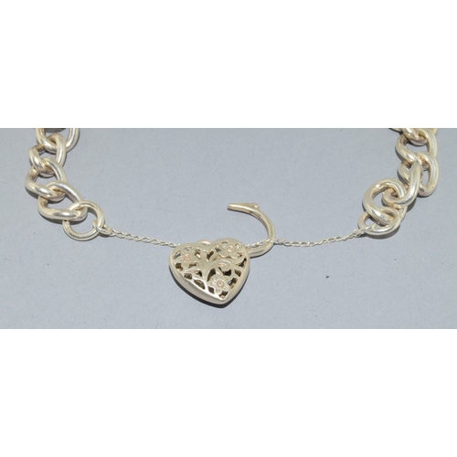 27 - 925 silver bracelet with a fancy heart open work padlock and safety chain 42grams&nbsp;