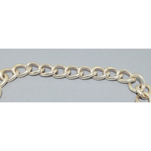 27 - 925 silver bracelet with a fancy heart open work padlock and safety chain 42grams&nbsp;