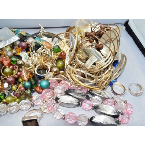 53 - Large quantity of costume and other jewellery to include silver
