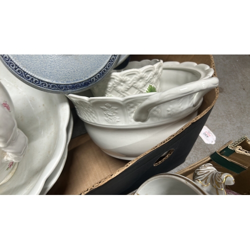 1005 - Vintage porcelain wash basin set featuring floral motifs and gilt accents, including pitcher and var... 
