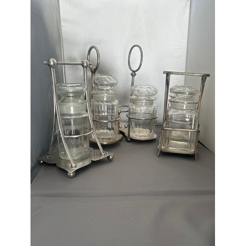 1016 - THREE VICTORIAN SILVER PLATE & CUT GLASS PICKLE JAR STANDS. Examples by James Dixon and sons, Fr... 