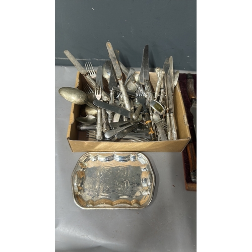 984 - Collection of vintage silver-plated cutlery and carving set with wooden handles, featuring intricate... 