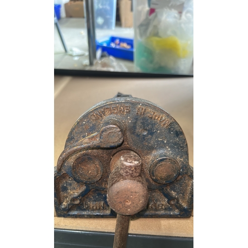 986 - Two vintage cast iron bench vices with handles and industrial design, featuring visible casting mark... 