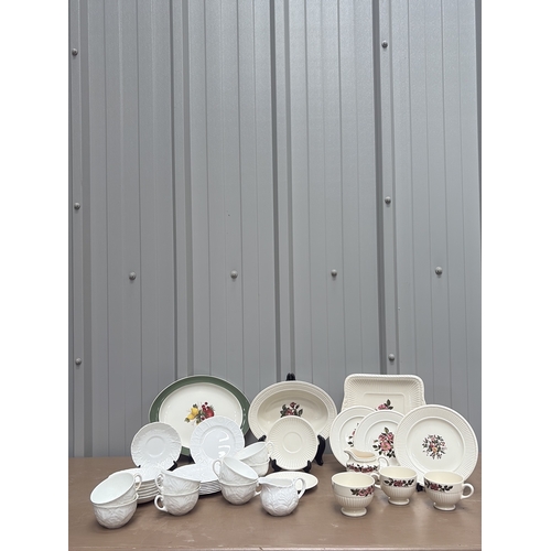 1005 - Vintage porcelain wash basin set featuring floral motifs and gilt accents, including pitcher and var... 