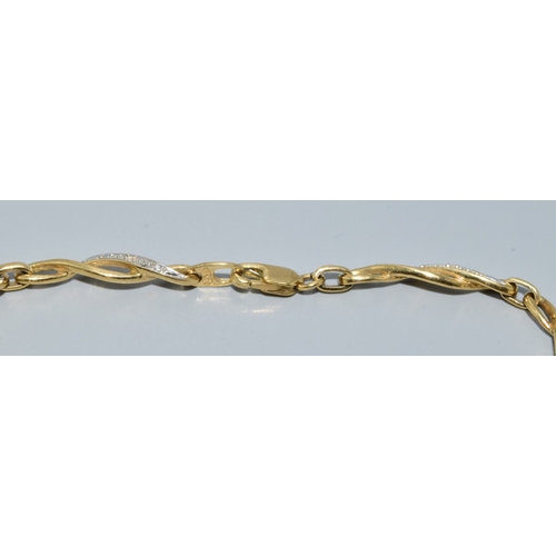 17 - 9ct gold and diamond Celtic style lobster claw bracelet with diamond insert. 7 inches long 5.7g
