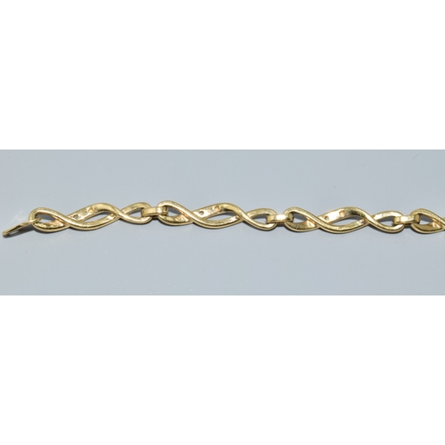 17 - 9ct gold and diamond Celtic style lobster claw bracelet with diamond insert. 7 inches long 5.7g