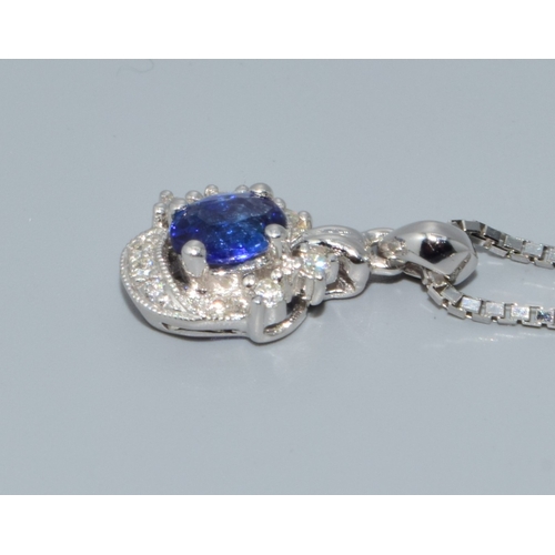 199 - 18ct white gold Diamond and Sapphire pendant necklace on a 40cm chain