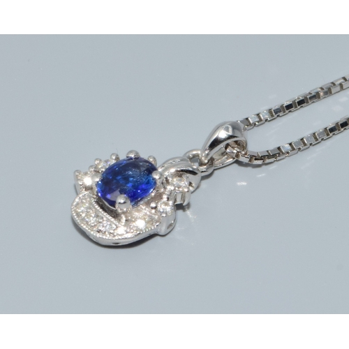 199 - 18ct white gold Diamond and Sapphire pendant necklace on a 40cm chain