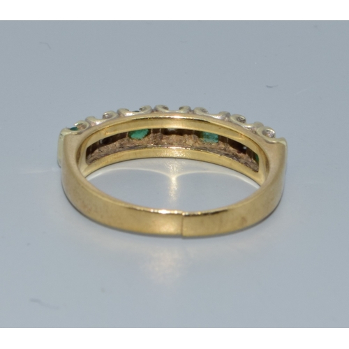 201 - 9ct gold ladies Diamond and Emerald 1/2 eternity ring hallmarked as 0.25ct size L