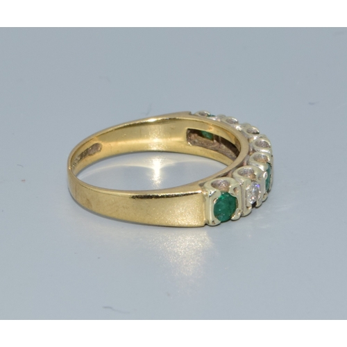 201 - 9ct gold ladies Diamond and Emerald 1/2 eternity ring hallmarked as 0.25ct size L