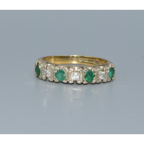 201 - 9ct gold ladies Diamond and Emerald 1/2 eternity ring hallmarked as 0.25ct size L