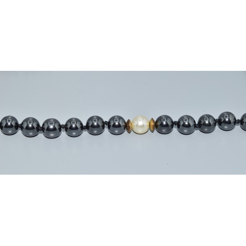 15 - Long strand of haematite and white pearl necklace all individually knotted 80cm long