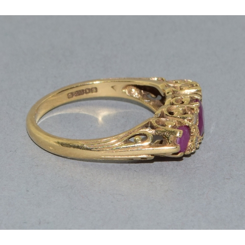 21 - Lovely 9ct gold vintage ladies Ruby and Diamond boat ring set in an open work scroll design size P 3... 
