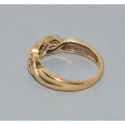 65 - 9ct gold ladies twit design Diamond ring hall marked as 0.25ct in the ring size N. 3.3grams