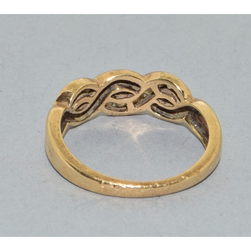 65 - 9ct gold ladies twit design Diamond ring hall marked as 0.25ct in the ring size N. 3.3grams