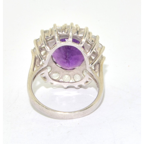 11 - 925 silver ladies large Amethyst halo design statement ring held in an open work claw setting size P