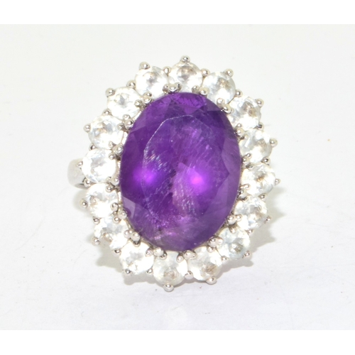 11 - 925 silver ladies large Amethyst halo design statement ring held in an open work claw setting size P